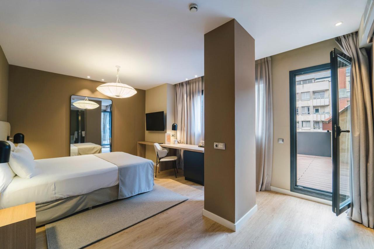 Barceló Oviedo Cervantes Exterior foto Room at the Hotel AC Barcelona